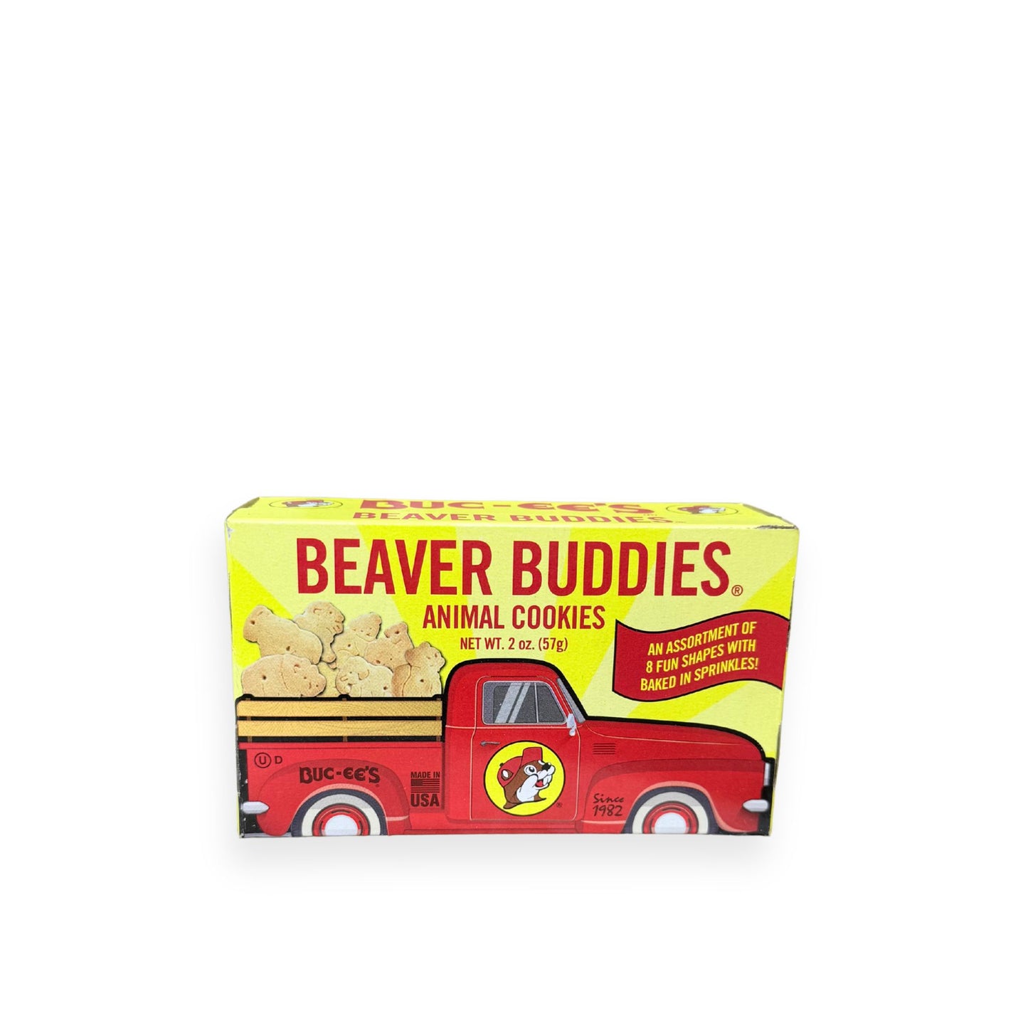 Buc-ee's Beaver Buddies Animal Cookies 2 oz yellow box featuring red vintage truck with beaver mascot logo, "ANIMAL COOKIES" text, net weight 57g, and "AN ASSORTMENT OF 8 FUN SHAPES WITH BAKED IN SPRINKLES" description showing Made in USA quality