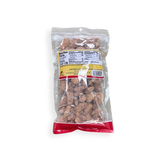 Buc-ee's Butter Toffee Pecans 12 oz clear plastic bag back view showing detailed nutrition facts label with 170 calories per serving and ingredient information