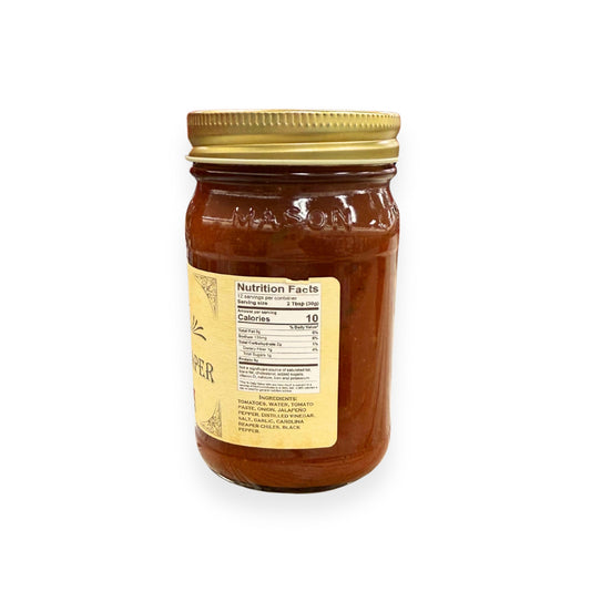 Buc-ee's Carolina Reaper Salsa 14 oz mason jar side view showing nutrition facts label, ingredients list including Carolina Reaper peppers, and golden yellow vintage-style labeling