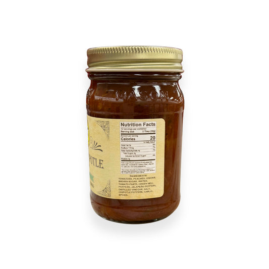 Buc-ee's Peach Chipotle Salsa 14 oz mason jar side view showing nutrition facts label with 12 servings per container, detailed ingredients list including peaches and chipotle peppers, and golden vintage-style labeling