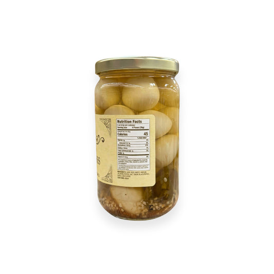 Buc-ee's Pickled Quail Eggs 16 fl oz glass jar side view showing nutrition facts label, multiple small quail eggs in clear brine with spices, and golden yellow vintage-style labeling
