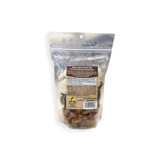 Buc-ee's small batch pecan trio 16oz bag back showing milk chocolate, white fudge, and honey glazed pecans with nutrition label and Bucky logo