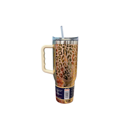 Side view of Yukon Outfitters Buc-ee's tumbler showing bold leopard print design with cream handle and product label