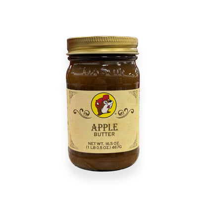 Buc-ee's Apple Butter 16.5 oz mason jar front view featuring iconic red beaver mascot logo and classic mason jar styling with golden lid, showing net weight 1 lb 0.5 oz