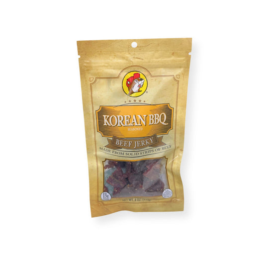 Buc-ee's Korean BBQ Beef Jerky 4oz bag front view showing gold and orange packaging with Buc-ee's beaver logo and Asian-inspired seasoned beef jerky strips visible