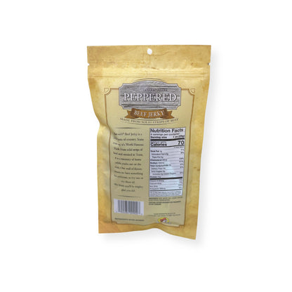 Buc-ee's Old Western Style Peppered Beef Jerky 4oz package back showing nutrition facts label, product description, and barcode with golden yellow packaging