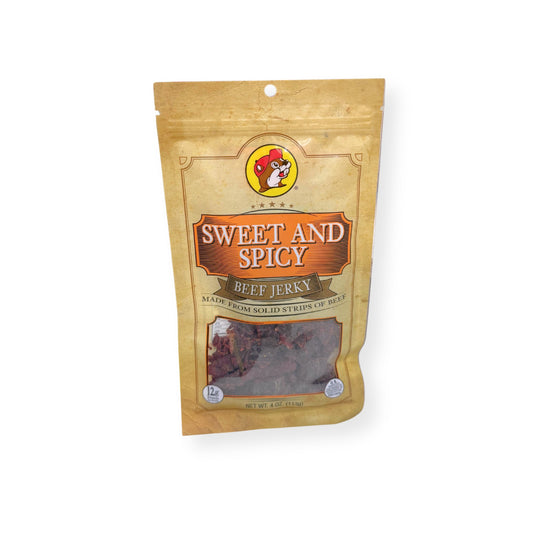 Buc-ee's Sweet and Spicy Beef Jerky 4oz bag front view showing gold and orange packaging with Buc-ee's beaver logo and premium beef jerky strips visible