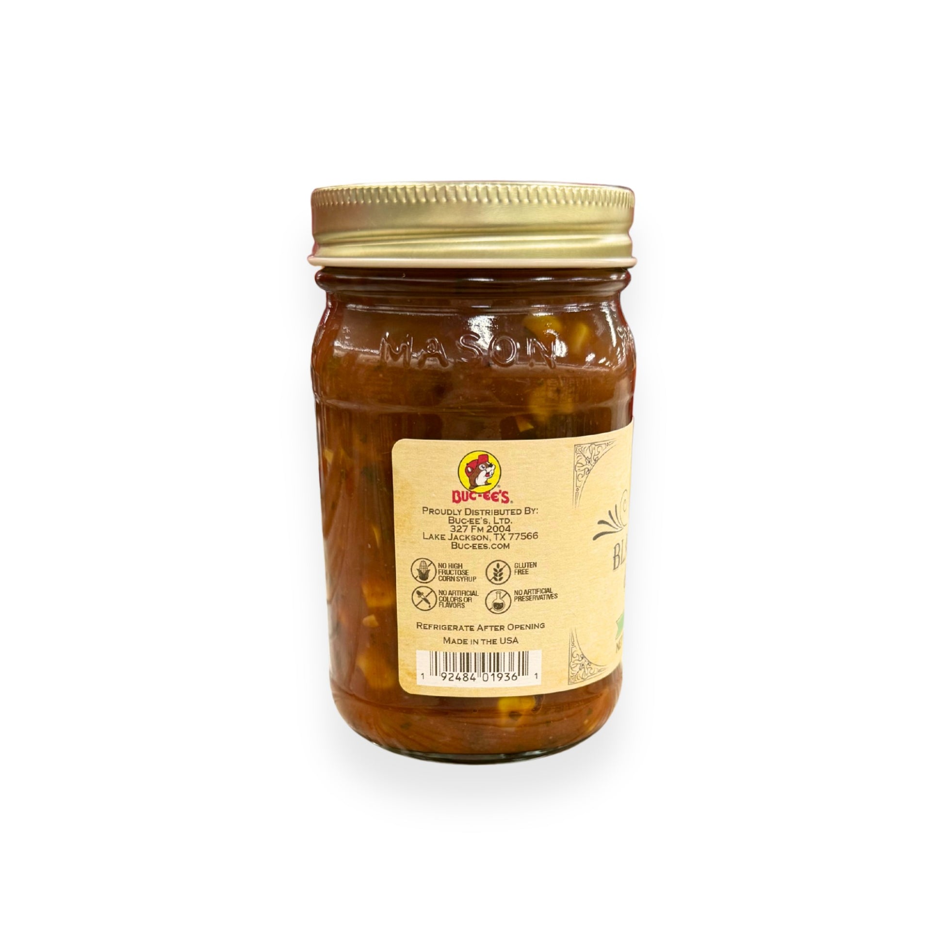 Buc-ee's Black Bean & Corn Salsa 14 oz mason jar back view showing Buc-ee's distributor information, product certifications including gluten-free and no artificial preservatives, barcode, and classic mason jar styling