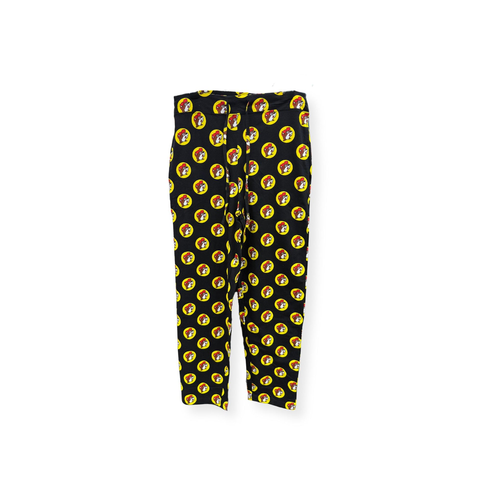 Black Buc-ee's pajama pants with all-over repeating yellow circle logo pattern, elastic waistband, unisex loungewear design