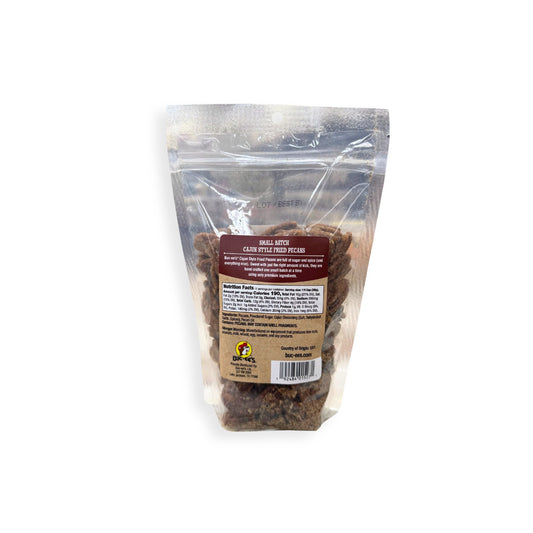 Buc-ee's small batch Cajun style fried pecans 12oz bag back showing seasoned pecans with nutrition label and Bucky logo on brown craft label