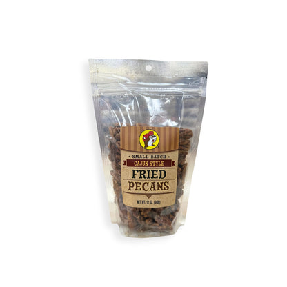 Buc-ee's small batch Cajun fried pecans front label with striped brown design, Bucky beaver logo, spicy fried pecans in resealable bag