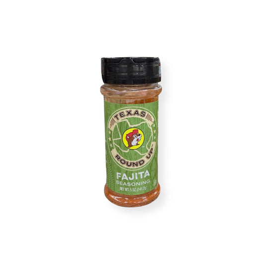 Buc-ee's Texas Round Up Fajita Seasoning 5 oz shaker container front view featuring green label with Texas state outline, beaver mascot logo, "TEXAS ROUND UP" and "FAJITA SEASONING" text with southwestern-themed design and black shaker top