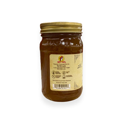 Buc-ee's Fig Preserves 17.5 oz mason jar back view showing Buc-ee's distributor information from Lake Jackson TX, gluten-free certification, no artificial preservatives badges, barcode, and storage instructions