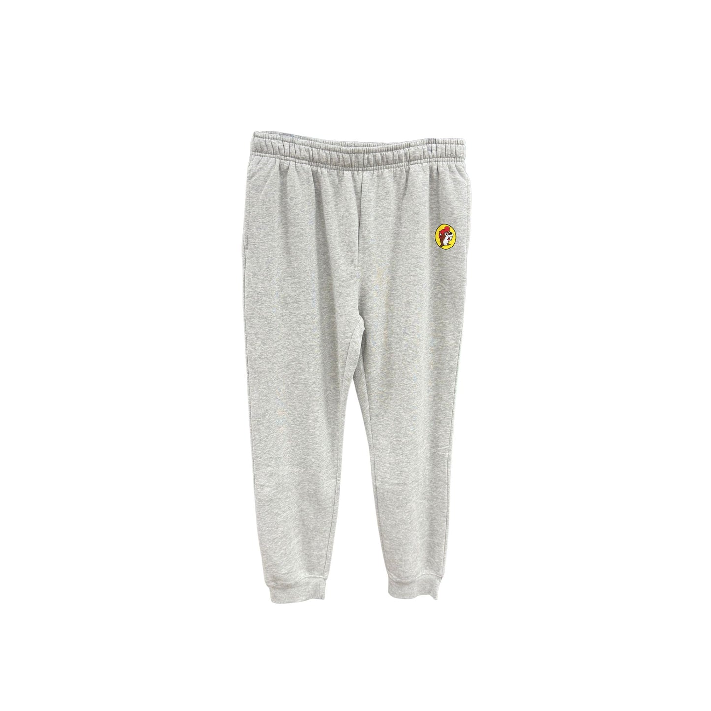 Gray heather Buc-ee's jogger sweatpants with subtle yellow circle logo patch on hip, elastic waistband with drawstring, and elastic ankle cuffs