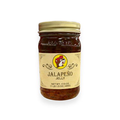 Buc-ee's Jalapeño Jelly 17.5 oz mason jar front view featuring iconic red beaver mascot logo and classic mason jar styling with golden lid, showing net weight 1 lb 1.5 oz