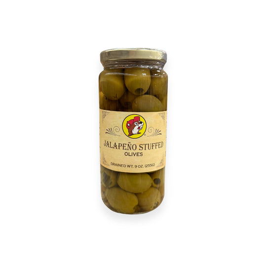 Buc-ee's Jalapeño Stuffed Olives 9 oz glass jar front view featuring iconic red beaver mascot logo, ornate vintage-style label design, and clear view of jalapeño-stuffed green olives