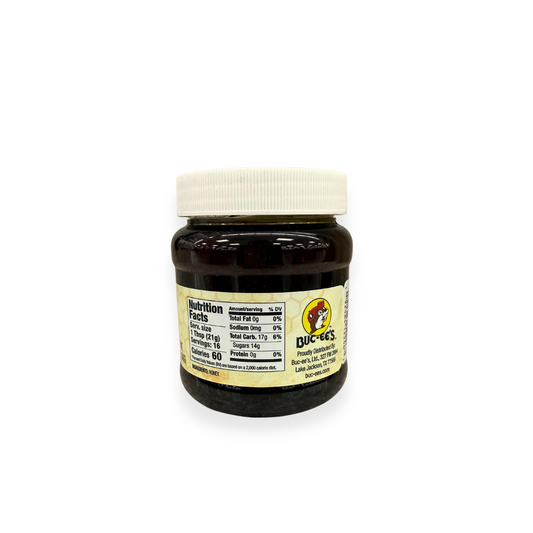 Buc-ee's Mesquite Honey 12 oz jar side view showing detailed nutrition facts label, ingredients showing honey, and Buc-ee's distributor information