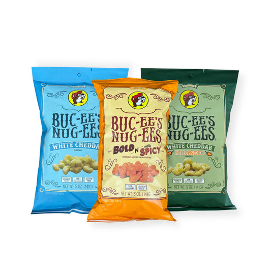 Three bags of Buc-ee's Nug-ees corn puffs in White Cheddar, Bold N Spicy, and White Cheddar Habanero flavors, 5 oz bags