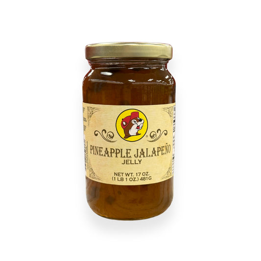 Buc-ee's Pineapple Jalapeño Jelly 17 oz mason jar front view featuring iconic red beaver mascot logo and classic mason jar styling with golden lid, showing net weight 1 lb 1 oz