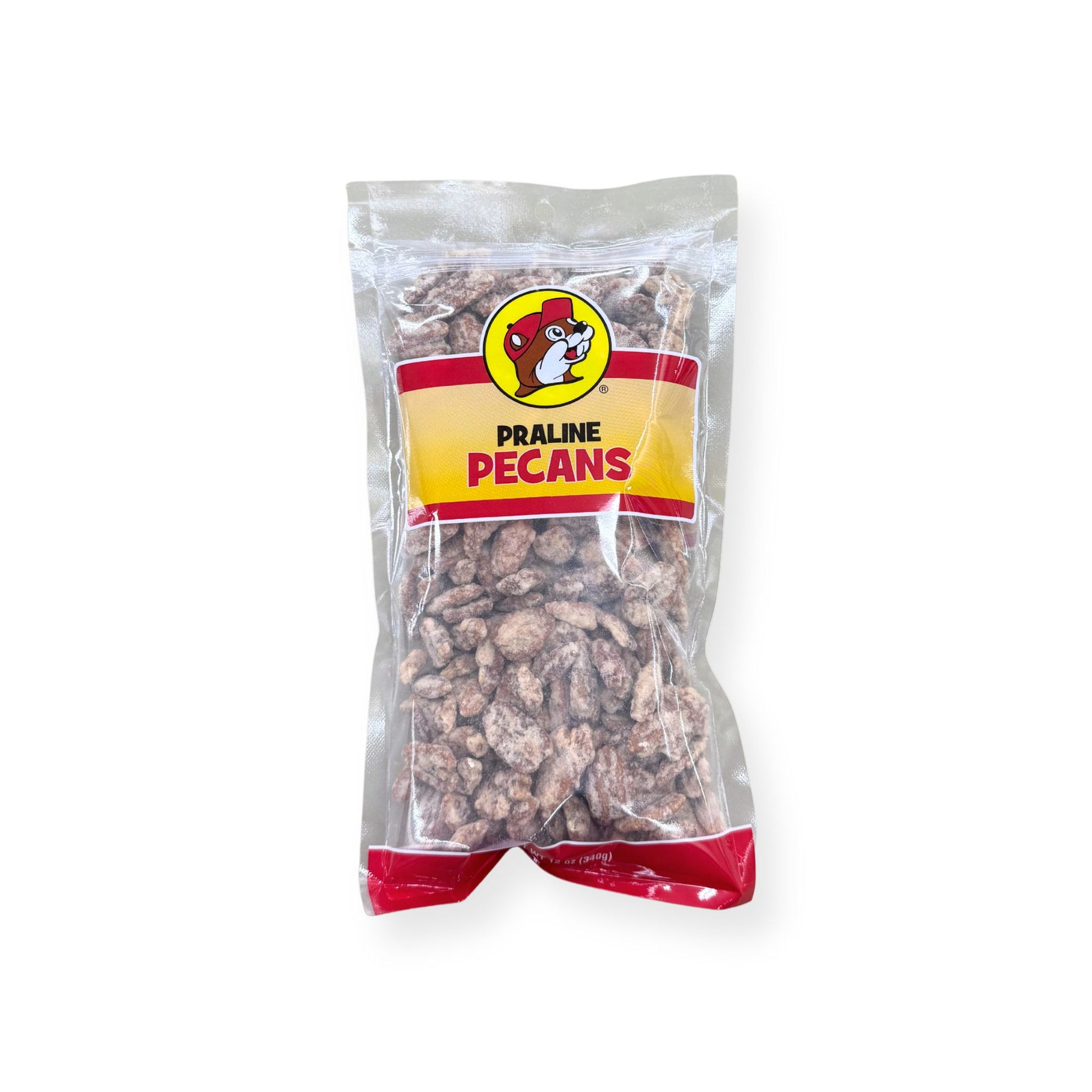 Buc-ee's Praline Pecans 12 oz clear plastic bag front view featuring iconic red beaver mascot logo, "PRALINE PECANS" text, and visible praline-coated pecans through clear packaging