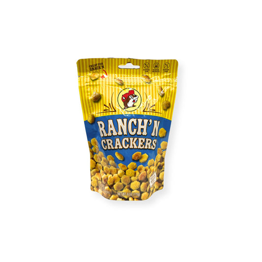 Buc-ee's Ranch'N Crackers 6 oz bright yellow and blue pouch front view featuring iconic red beaver mascot logo, "RANCH'N CRACKERS" text, and visible ranch-flavored crackers