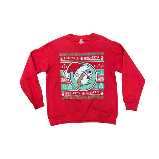 Red Buc-ee's ugly Christmas sweatshirt with fair isle pattern featuring Santa beaver in circle, snowflakes, trees, and repeating Buc-ee's text border in traditional holiday colors