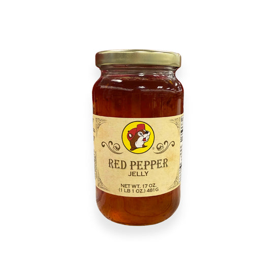 Buc-ee's Red Pepper Jelly 17 oz jar front view featuring iconic red beaver mascot logo, "RED PEPPER JELLY" text, and classic jar styling with golden lid