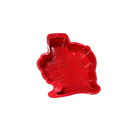Red Buc-ee's Bucky beaver-shaped cake pan with detailed embossed features including smiling face, iconic cap, and character outline for baking novelty cakes