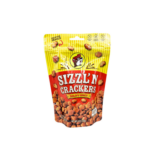 Buc-ee's Sizzlin' Crackers 6 oz bright yellow and red pouch front view featuring iconic red beaver mascot logo, "SIZZLIN' CRACKERS" text with "BOLD 'N SPICY" banner, and visible spicy crackers