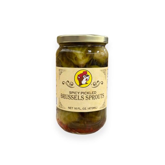 Buc-ee's Spicy Pickled Brussels Sprouts 16 fl oz glass jar front view featuring iconic red beaver mascot logo, ornate vintage-style label design, and clear view of pickled Brussels sprouts in spicy brine