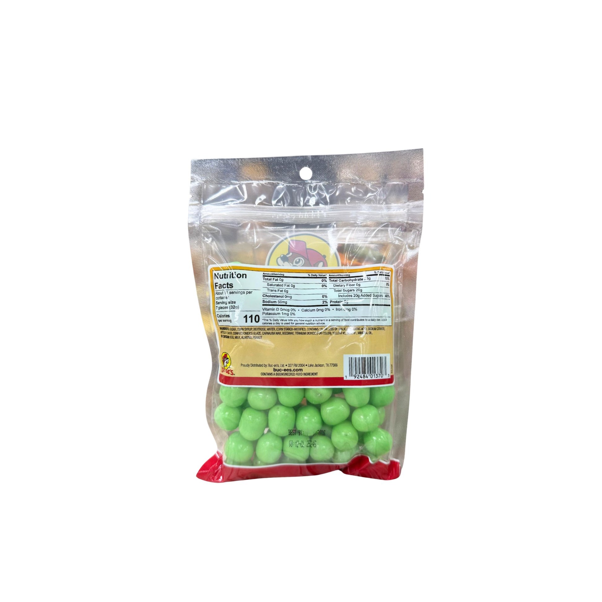 Buc-ee's watermelon sours 12oz bag back showing nutrition facts label and bright green sour candy balls in clear packaging