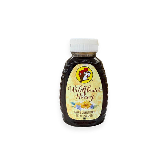 Buc-ee's wildflower honey 12oz front label with Bucky beaver logo, wildflower design, raw and unfiltered, bear-shaped bottle